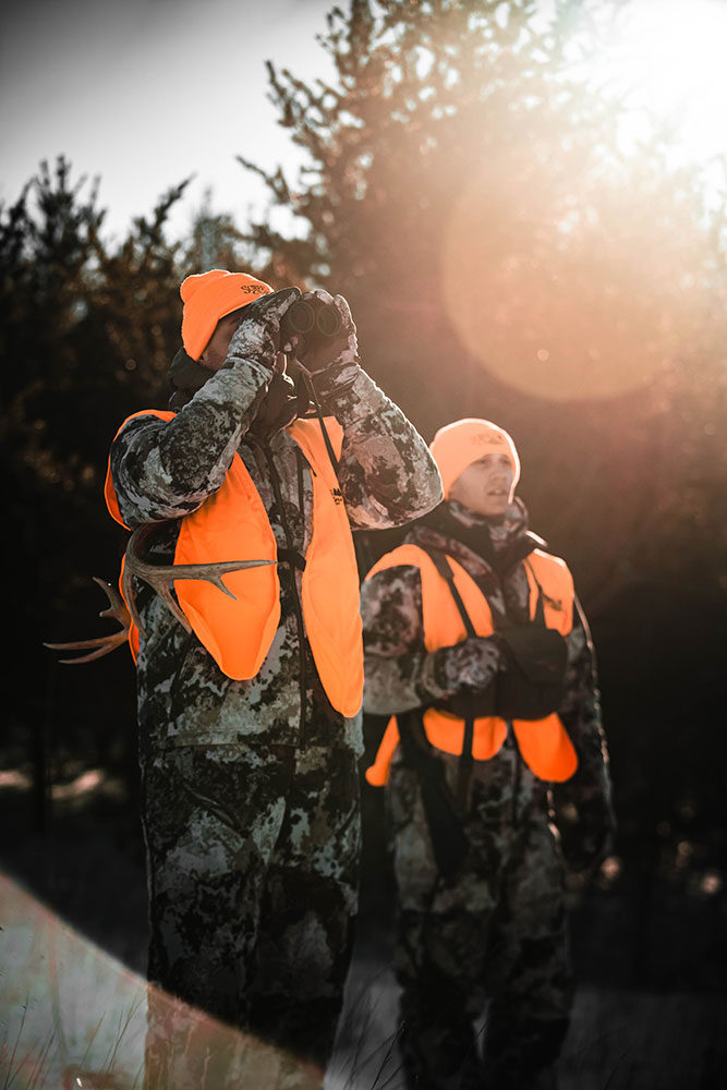 hunters, binoculars, orange vests, orange hats, camoflage, Baxter MN, brand development, marketing materials, Rawfish Media, videography, photography, social media management